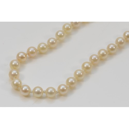 327 - A 9ct white gold clasp cultured pearl necklace, individually knotted pearls, 16g