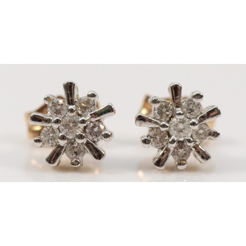 328 - A pair of 9ct gold diamond cluster earrings, 1g