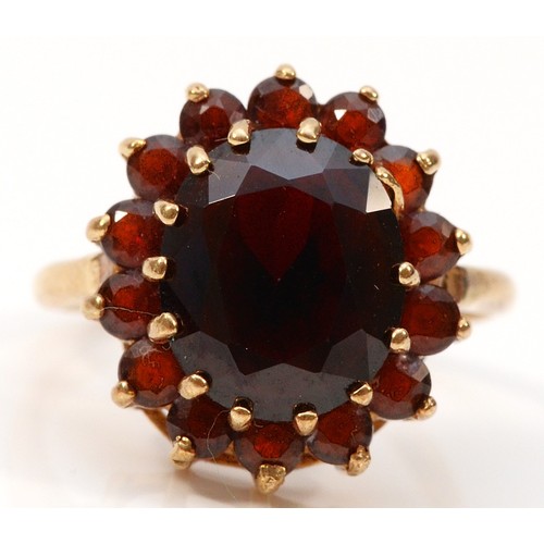 332 - A 9ct gold garnet cluster dress ring, M, 5.4g