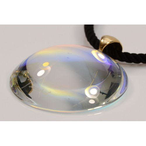 335 - An 18ct gold Baccarat glass pendant with a black cord chain and 9ct gold clasp, 35mm diameter pendan... 