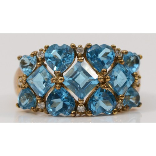 339 - A 9ct gold vari-cut blue gemstone dress ring, Q, 4.4g