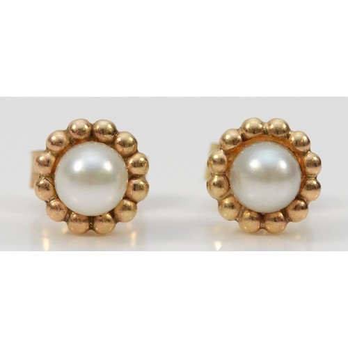 353 - A pair of 9ct gold cultured pearl earrings with scroll backs, 0.5g