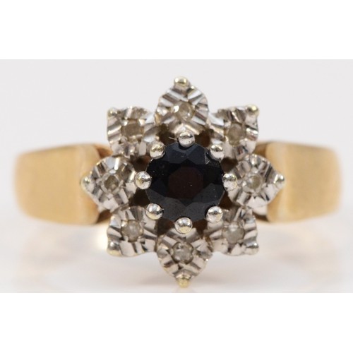 358 - A 9ct gold diamond and sapphire cluster ring, London 1979, M, 3.3g