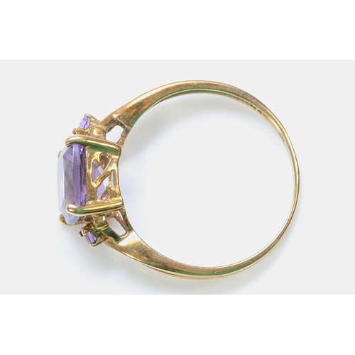 360 - A 9ct gold amethyst three stone dress ring, P, 1.9g