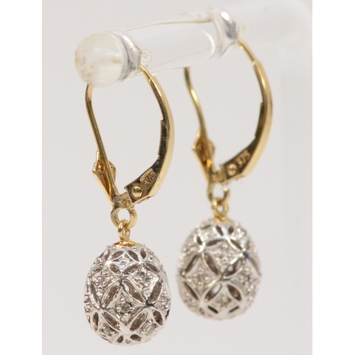 362 - A pair of 9ct gold diamond set egg shaped drop earrings with hooks, 3g