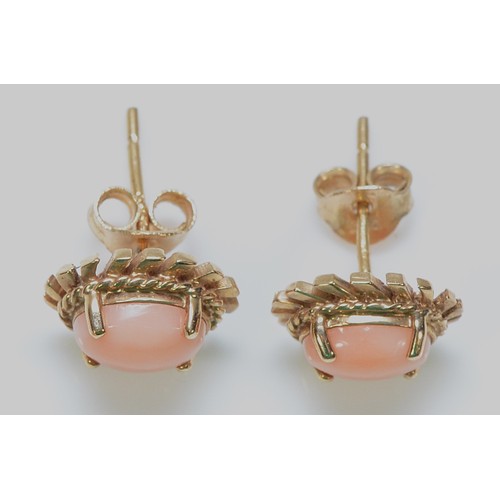 369 - A pair of 9ct gold coral earrings with scroll backs, 1.6g