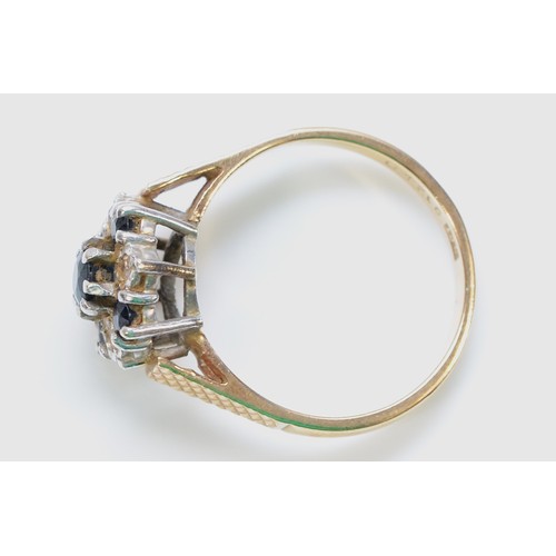 374 - A 9ct gold diamond and sapphire cluster ring, N 1/2, 3.2g