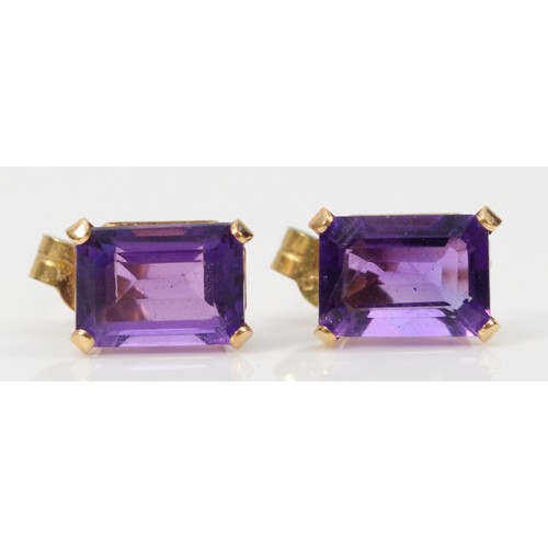 490 - A pair of 9ct gold amethyst earrings with scroll backs, 7mm x 5mm, 0.7g