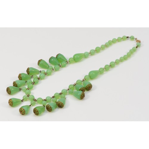 492 - A 9ct gold antique green and clear glass bead necklace, 48.3g