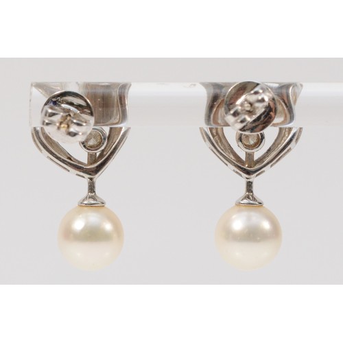 493 - A pair of 18ct white gold cultured pearl and diamond heart shaped earrings with scroll backs, 20mm d... 