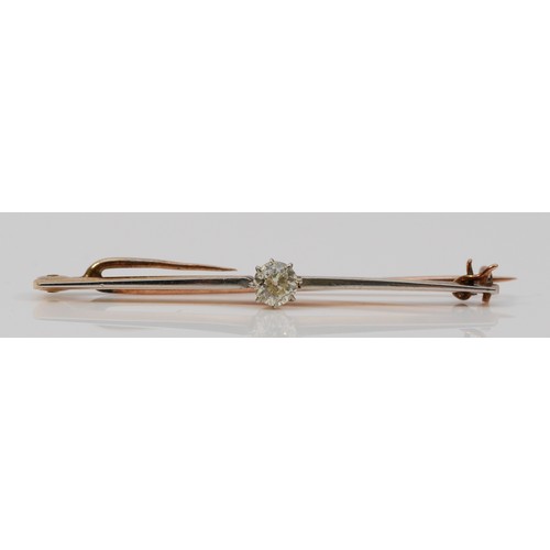 494 - A 15ct gold and platinum old cut diamond single stone brooch with a 9ct gold pin, 45mm across, 2.5g