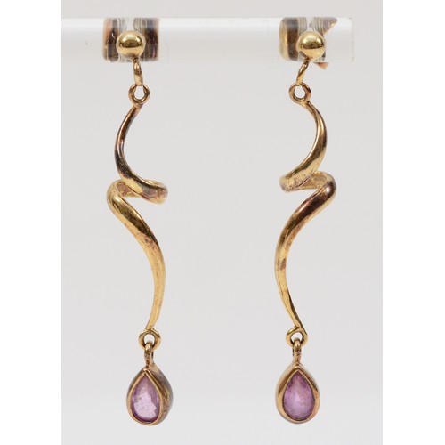 496 - A pair of 9ct gold pink sapphire spiral drop earrings with scroll backs, 40mm drop, 3g