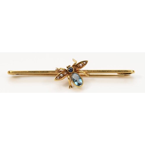 501 - A 15ct gold sapphire, aquamarine and seed pearl fly brooch with a 9ct gold pin, 50mm across, 3.1g