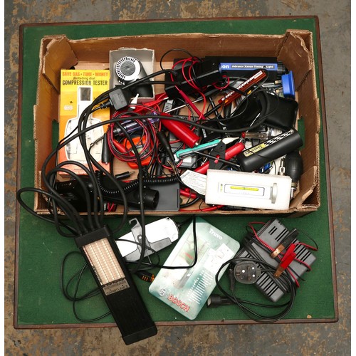 7 - A box of diagnostic, charging and calibration tools including, a Gunson timing light.