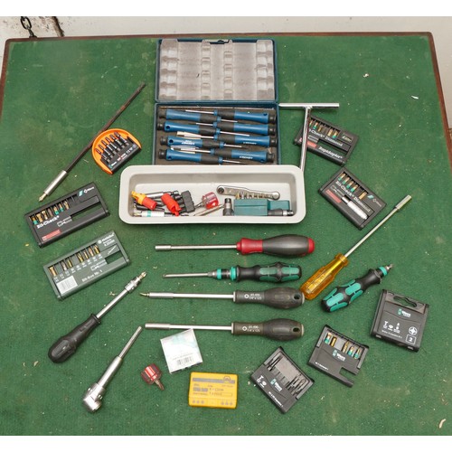 33 - A collection of 6mm socket screwdrivers, impact pieces and adaptors in a box, includes brands Wera a... 