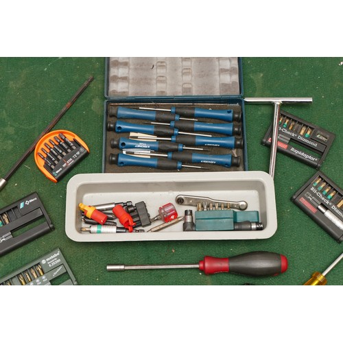 33 - A collection of 6mm socket screwdrivers, impact pieces and adaptors in a box, includes brands Wera a... 