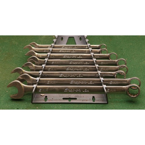 39 - A collection of Snap On metric ring spanners, sizes from 12-19mm. (8 spanners and a storage stand)