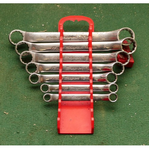 40 - A collection of Snap On metric ring spanners, sizes from 8-20mm. (7 spanners and a storage stand).