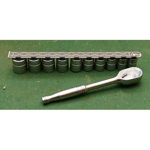 41 - A Snap On 1/2 inch drive ratchet and 10 sockets (sizes range from 20-30mm).