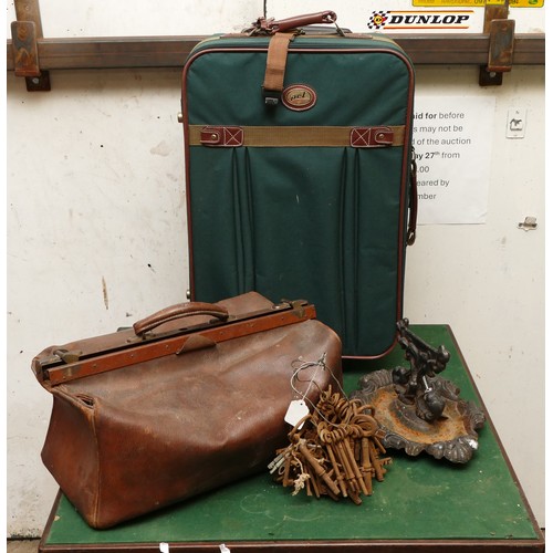 58 - A collection of keys, a cast iron boot scrapper, a leather Gladstone bag, also a PLC green coloured ... 