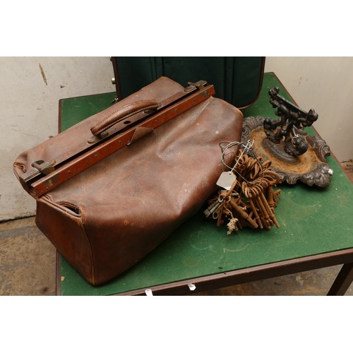 58 - A collection of keys, a cast iron boot scrapper, a leather Gladstone bag, also a PLC green coloured ... 