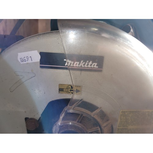 81 - Makita LS 1013 260mm 1430W cross cut saw.