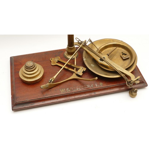 113 - A set of early twentieth century brass balance scales, marked W and T Avery Ltd, Class B on a raised... 