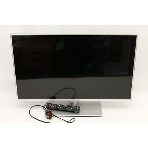 124 - A Panasonic TX-32E6B LCD TV, with AC lead and remote.