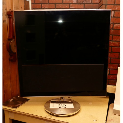 129 - Bang & Olufsen; 'Beovision 10' TV 40 inch screen, with stand, booklet, AC leads and remote.