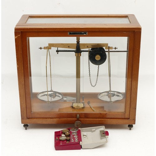139 - A set of Griffin & George scientific balance scales, in glazed wooden case, circa mid 20th century
3... 