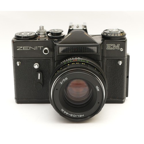 151 - A Zenit EM camera with a Helios f/2 58mm lens, in case.