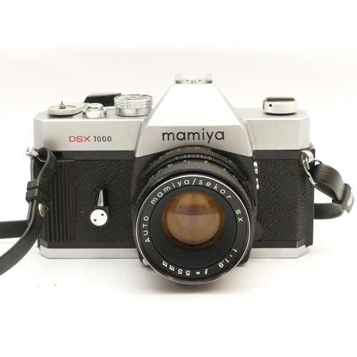 154 - A Mamiya DSX 1000 SLR camera with a Mamiya/Sekot SC f/1.8 55mm lens.