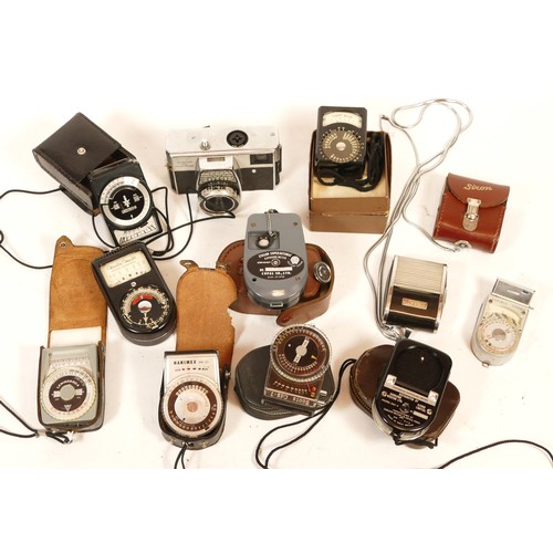 155 - A collection of light meters, cameras and cine cameras to include, Weston Master V,a Sankyo Auto-4x,... 