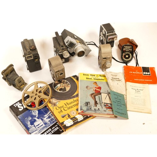 155 - A collection of light meters, cameras and cine cameras to include, Weston Master V,a Sankyo Auto-4x,... 