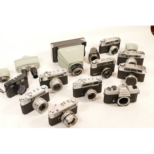156 - A collection of cameras, primarily Yashica, to include a Minister-D, a Lynx 5000, and an ME1, togeth... 