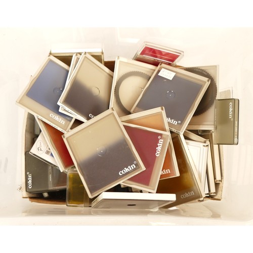 157 - A collection of camera accessories together with two cameras and two lenses, housed in two fabric sa... 