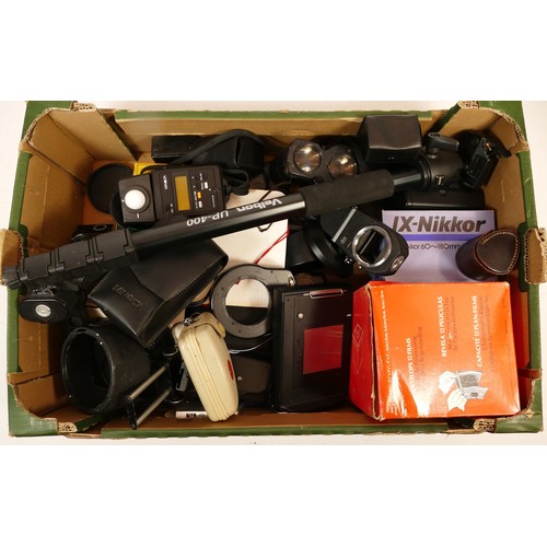 157 - A collection of camera accessories together with two cameras and two lenses, housed in two fabric sa... 