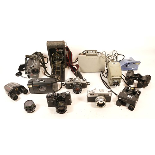 162 - A collection of cameras, to include, Polaroid Joycam, Zenit TTL, Minolta Hi-Matic 11, Canon UC9 Camc... 