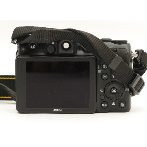 173 - A Nikon Coolpix P7100 digital camera.