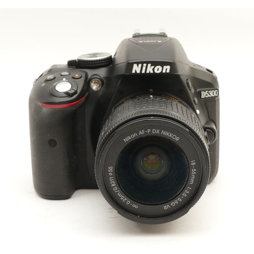 176 - A Nikon D5300 DSLR camera with Nikon Nikkor f/3.5-5.6 18-55mm lens.