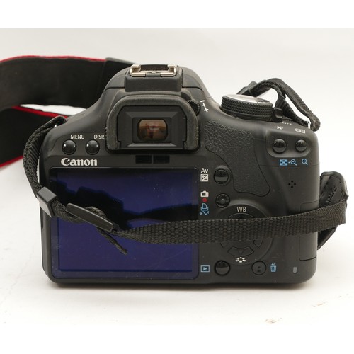 186 - A Canon EOS 500D camera with a Canon EF-S f/3.5-5.6 18-55mm lens.