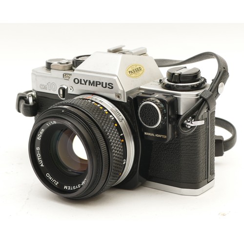 194 - An Olympus OM10 film camera with an Olympus Zuiko f/1.8 50mm lens.