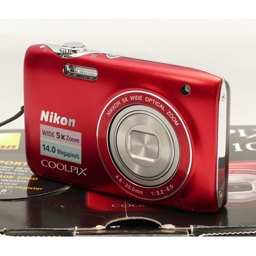 202 - A Nikon Coolpix S3100, in red, with box.