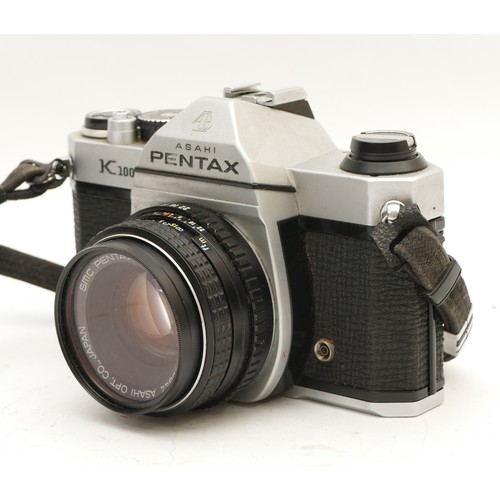 210 - An Asahi Pentax K1000 film camera, with a Pentax-M f/2 50mm lens.