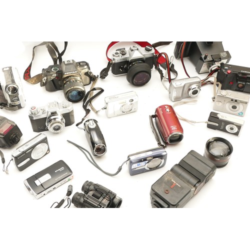 218 - A collection of cameras and camera accessories, to include, Pentax P30, Fujica ST605N, Polaroid Squa... 