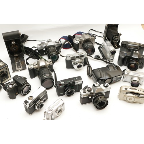 221 - A collection of cameras and camera accessories, to include, Olympus OM101, Olympus SP-560UZ, Kodak R... 