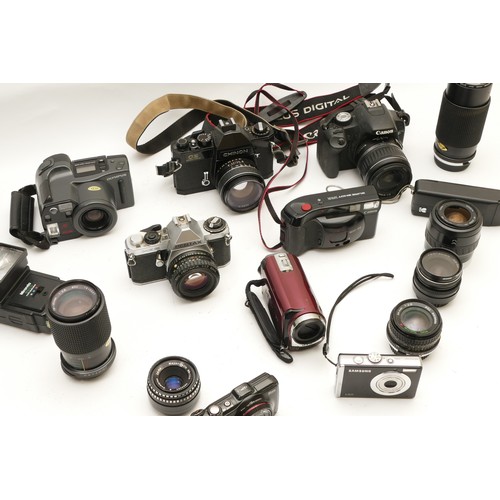 226 - A collection of cameras and camera accessories, to include, Canon 500D, Canon SureShot Supreme, JVC ... 