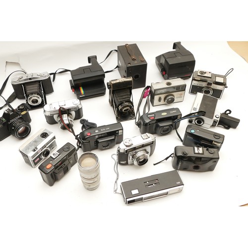 231 - A collection of cameras and camera accessories, to include, Halina Paulette, Polaroid Supercolor 670... 