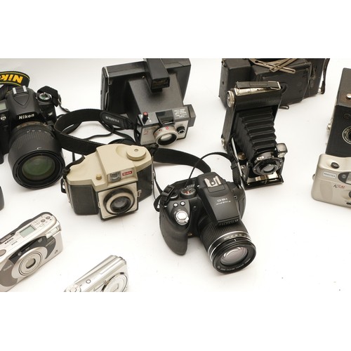 233 - A collection of cameras and camera accessories, to include, Nikon D90, Polaroid Square Shooter 2, Pr... 