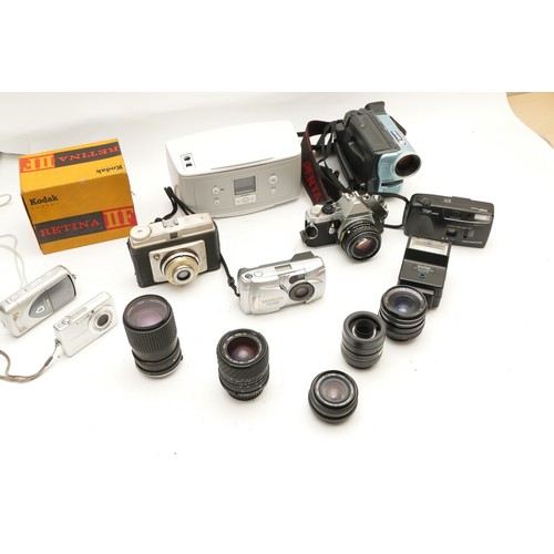 234 - A collection of cameras and camera accessories, to include, Olympus Trio Junior, Nikon Coolpix 2500,... 